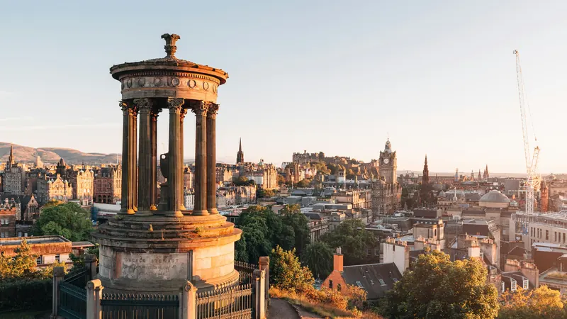 Photo of the Dugald Stewart Monument above the Edinburgh skyline