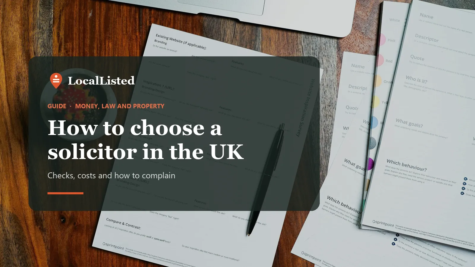 How to choose a solicitor in the UK. Photo: legal papers and a pen on a wooden desk.